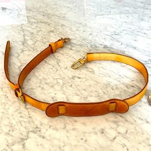 Louis Vuitton leather shoulder strap. Slight discoloration.